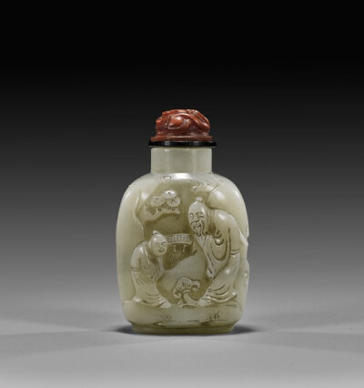 CARVED CELADON JADE SNUFF BOTTLE 青玉雕人物紋鼻煙壺 Finely hollowed, whitish celadon jade snuff bottle; the front carved with scene of a scholar and boy in a landscape setting with bridge in the backg…