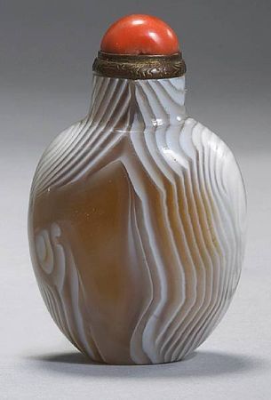 Property from the Estate of Gardner Hart Pierson. A banded agate snuff bottle. Of a compressed ovoid form, with a flat mouth rim and wide mouth, a flat oval base, the interior very well-hollowed, the …