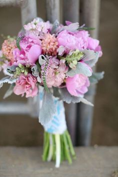 Gorgeous lush pink bouquet with peonies | Rustic Glam Country Wedding | Photograph by Lucy Munoz Photography http://www.storyboardwedding.com/rustic-vintage-glamour-styled-country-wedding-featuring-soft-pinks-sweet-grays-spots-of-sparkle/