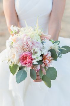 pastel wedding bouquet for bride #bouquet #wedding #weddingchicks http://www.weddingchicks.com/2014/01/29/shabby-chic-barn-wedding/