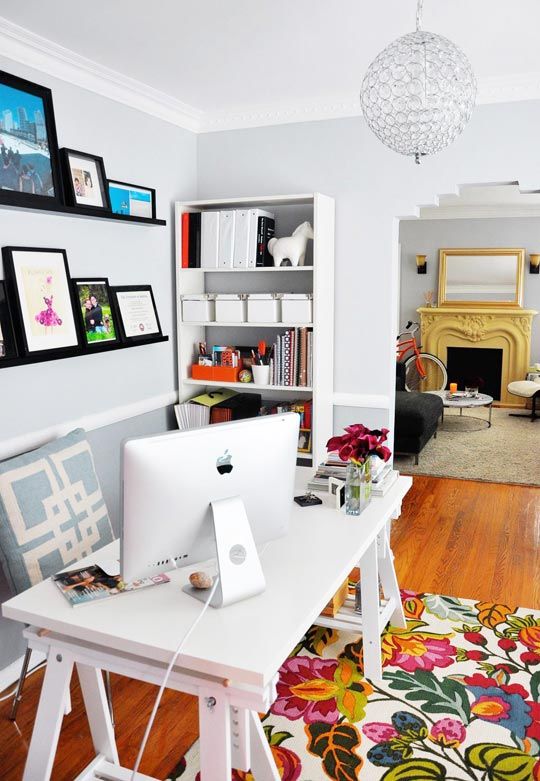 Been trying to find a picture like this forever!!! I love white; this is a major inspiration for my home office (or when I hit the big time, my photography studio!!!!). The rug is stunning, too. And check out the yellow fireplace - SWOON!!!