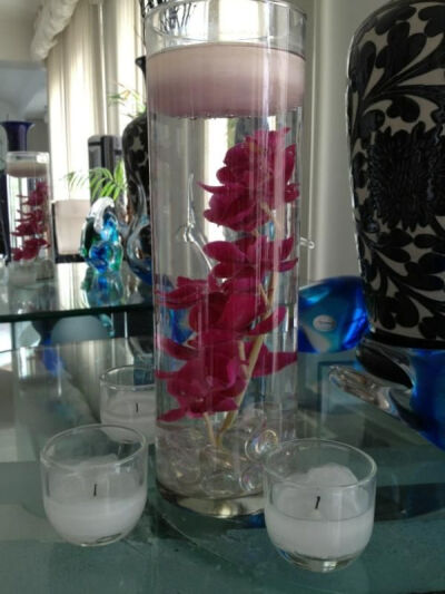 DIY submerged orchids : wedding centerpiece diy diy centerpiece pink reception submerged flowers AoI9eLfCAAAl3YO