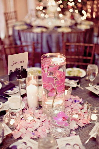 Kind of a sucker for submerged flowers and floating candles. Could this be part of a multi-tiered centerpiece using my favorite old mason jars, wine bottles and other vintage glass?