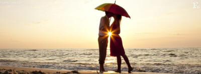 couple kissing under umbrella fb timeline cover