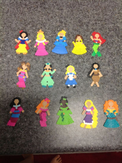 Disney Princess (made on large circle board) perler beads by Holly B.