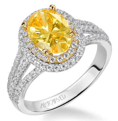 黄色宝石戒指 明媚灿烂的黄色宝石戒指，象征着阳光般明媚的积极状态，在它的照耀下，你的爱情也会灿烂如向日葵。