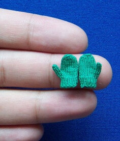 Tiny Mittens knit with sewing thread