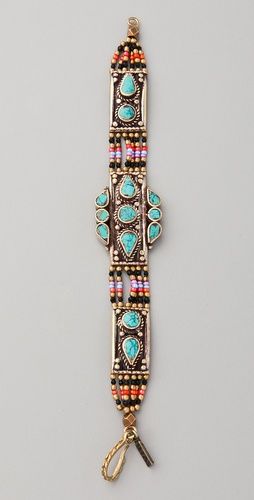 large moonshield bracelet by Vanessa Mooney.