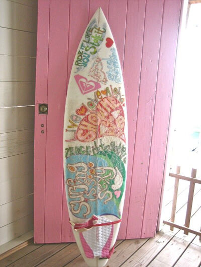 pink door and surf board