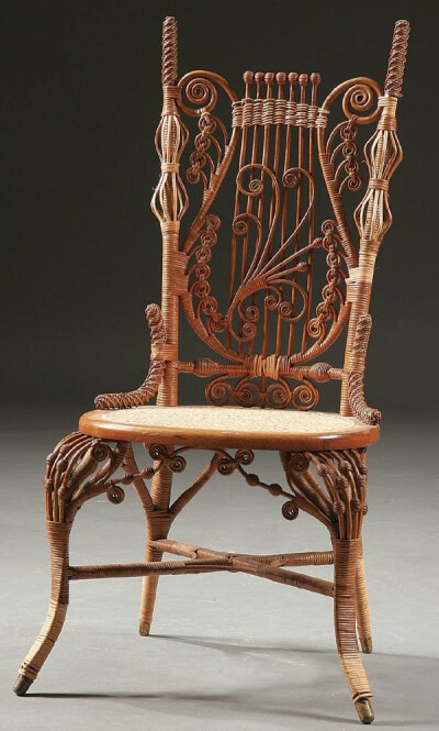 A VICTORIAN WICKER MUSIC CHAIR circa 1900