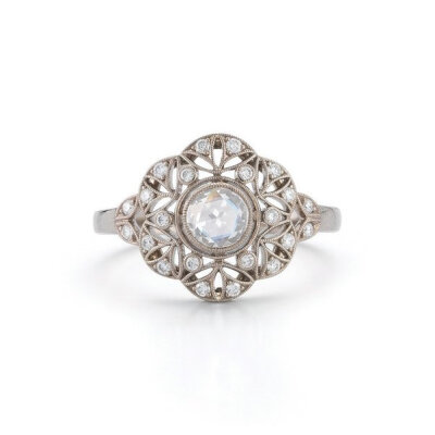 Flower-shaped diamond engagement ring Kwiat Vintage Collection Ring, .58 carat of diamonds set in 18-karat white gold.