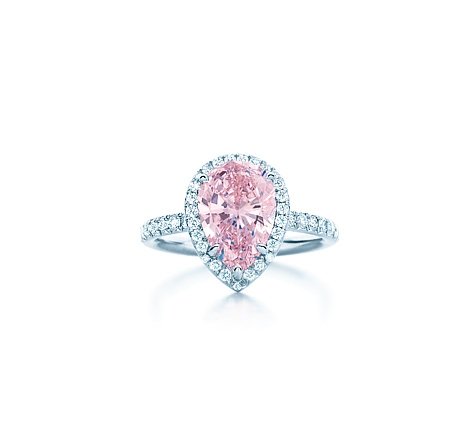 Fancy Intense Pink diamond ring Tiffany's colored diamonds, the world's rarest, celebrate nature as the mystical source of beauty. A beautiful ring of platinum with a pear-shaped pink diamond and a single row of round brilliant white diamonds. Fancy Intense Pink diamond, carat weight 2.11