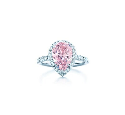 Fancy Intense Pink diamond ring Tiffany's colored diamonds, the world's rarest, celebrate nature as the mystical source of beauty. A beautiful ring of platinum with a pear-shaped pink diamond and a s…