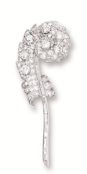 DIAMOND 'FEATHER' BROOCH, MOUNTED BY CARTIER, CIRCA 1930. Modelled as a feather, set with old-cut and baguette diamonds together weighing approximately 10.00 carats, mounted in 18 karat white gold, signed Monture Cartier