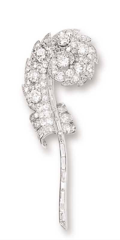 DIAMOND 'FEATHER' BROOCH, MOUNTED BY CARTIER, CIRCA 1930. Modelled as a feather, set with old-cut and baguette diamonds together weighing approximately 10.00 carats, mounted in 18 karat white gold, si…