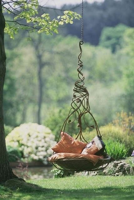 Love this garden hanging chair!!!