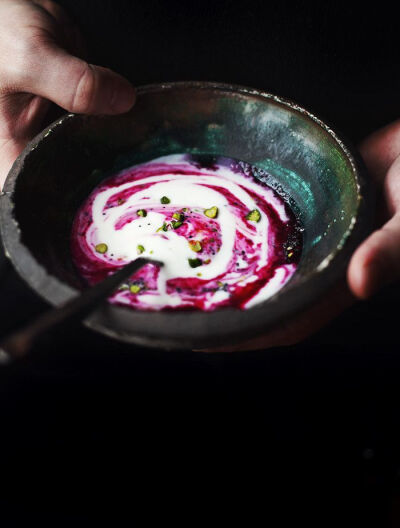 Breakfast yogurt with beetroot, honey and pistachios.