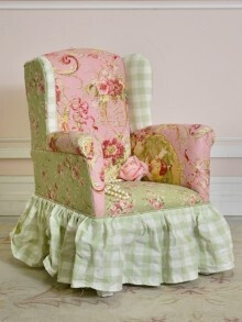 A miniature dollhouse chair in pretty pink and green mixed patterns!