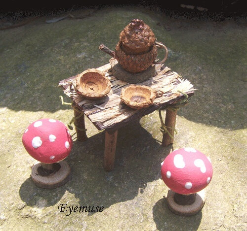 acorn teapot and acorn cap plates with mushroom stools for the table