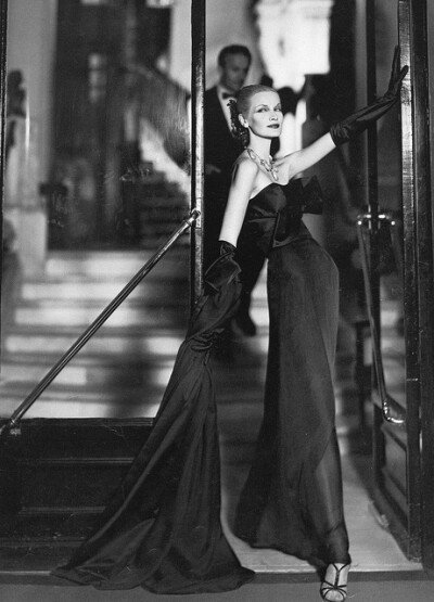 Sunny Harnett in evening dress by Lanvin-Castillo, photographed by Avedon at the Hotel San Règis, Paris, August 1954.