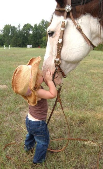 Baby cowgirl with her horse..so cute.