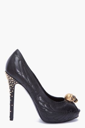 Studded Skull Pump by Alexander McQueen. Never thought I'd like a shoe with skulls on it but this is actually really cute. Love the stitched wing pattern too.