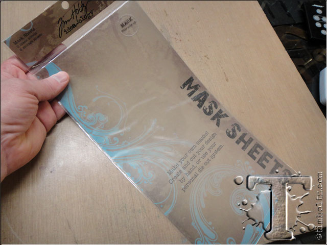 step 9: for the images i want to be the top layer or focal points we need to make a mask of that image. i’m using my mask sheets from idea-ology. these mask sheets are clear acetate with repositionable adhesive backing and completely reusable.