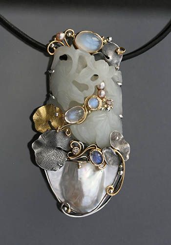 Pendant | Eve Llyndorah. &amp;quot;Moon Garden&amp;quot;. Antique Chinese white jade lotus carving, sterling silver, 18k gold, moonstones, embryo pearl, fresh water pearls, champagne diamonds (0.24TCW), and rolled leather cord with sterling silver tips.