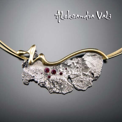 Pendant | Aleksandra Vali. &amp;quot;Ray of Light&amp;quot; Oxidized sterling silver, garnets, 24k gold