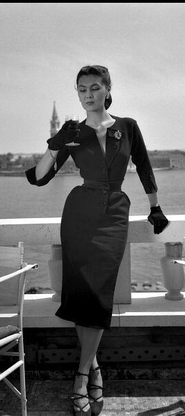 1951Alla in dress by Christian Dior near the Piazza San Marco in Venice, the island of San Giorgio Maggiore is visible in the background