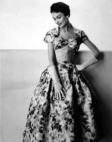 An utterly gorgeous (love the neckline!) 1950s rose print evening dress.