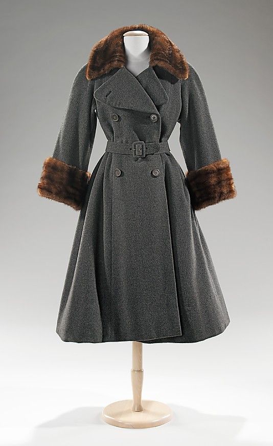 Coat Norman Norell (American, Noblesville, Indiana 1900–1972 New York) Manufacturer: Traina-Norell (American, founded 1941) Date: ca. 1955 Culture: American Medium: wool, fur Dimensions: Length at CB: 48 in. (121.9 cm)