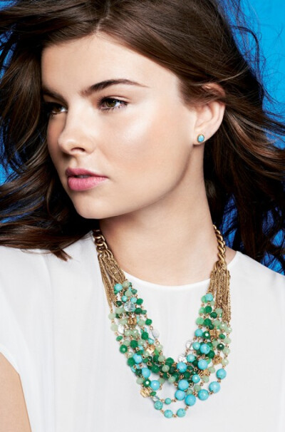 Maldives Necklace with green &amp;amp; golden beads from Stella &amp;amp; Dot. Photo of beaded necklace &amp;amp; gold-plated chain.