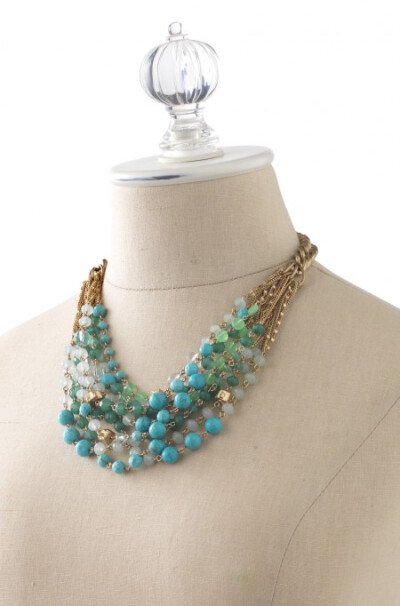 Maldives Necklace with green &amp;amp; golden beads from Stella &amp;amp; Dot. Photo of beaded necklace &amp;amp; gold-plated chain.