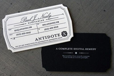 Antidote X die-cut business card