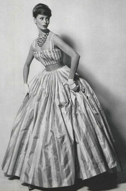 Model wearing an evening gown for L’Officiel, 1959.