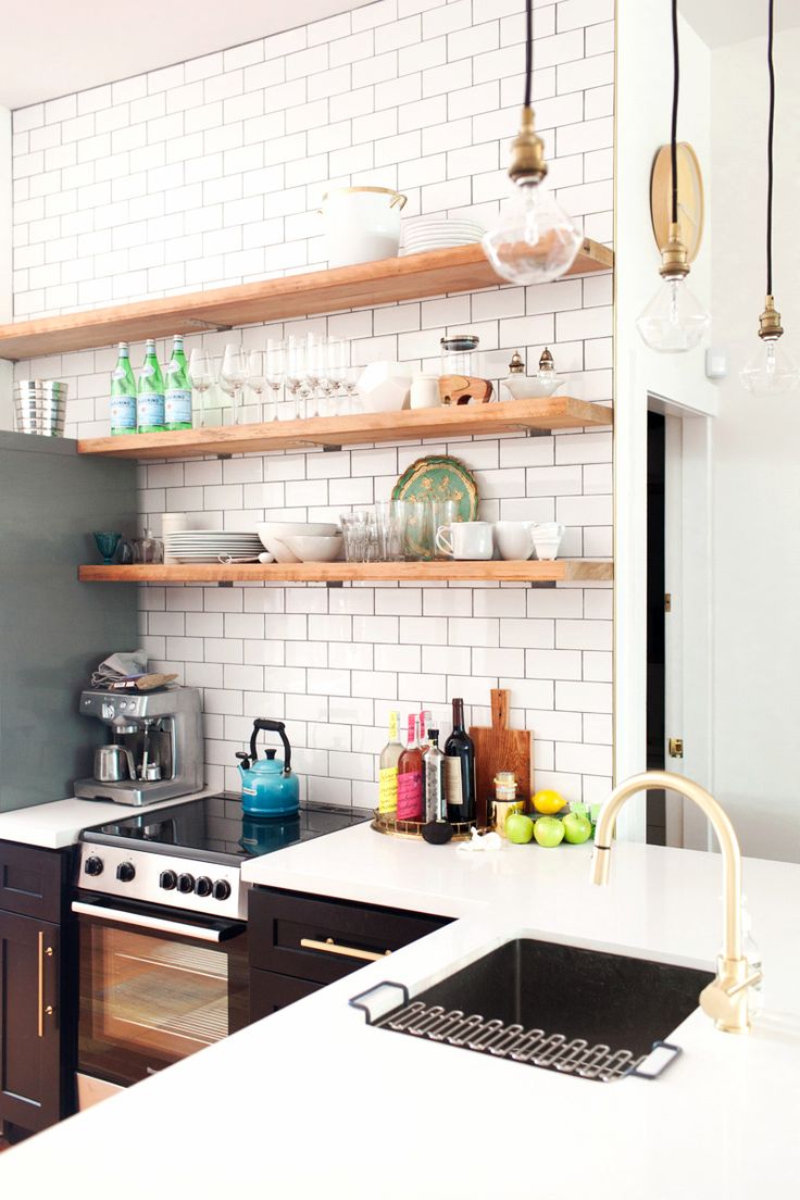 white subway tile + wood shelving