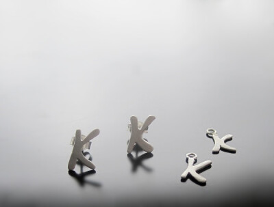 Initial letter post earrings -Custom-made initial letter earrings and charms in sterling silver.