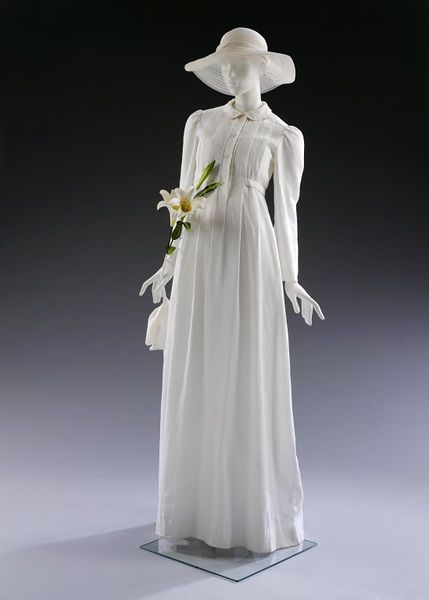 Wedding ensemble, dress by Geoffrey Beene, a Frank Clive hat and Beth Levine shoes, USA, 1975 which was worn by Beene's house model Catharina Oeschger.