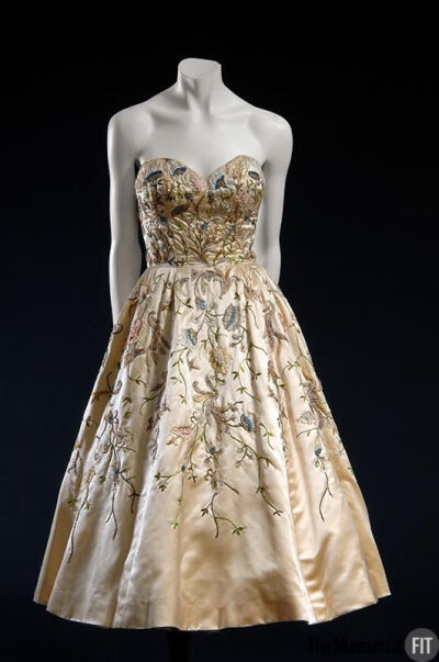 Christian Dior Evening Dress 1951 from ivory silk satin with polychrome.