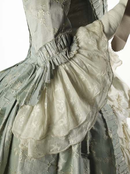 Fashion 18th Century ball gown dress ensemble costume circa from 1752-1775. Made from very fine silk, lace and trim with embroidered small flower floral pattern in off white woven into the pale blue background. Hat decorated with millinery flower.