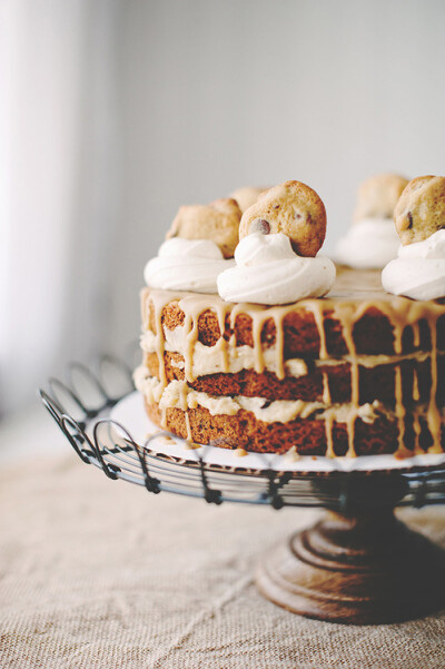 chocolate chip cookie layer cake with cookie dough filling, salted caramel icing, and brown sugar buttercream.