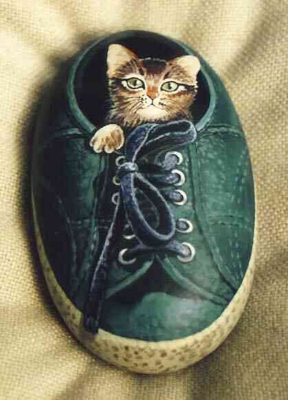 Wow! This Shoe Cat is a painted rock!