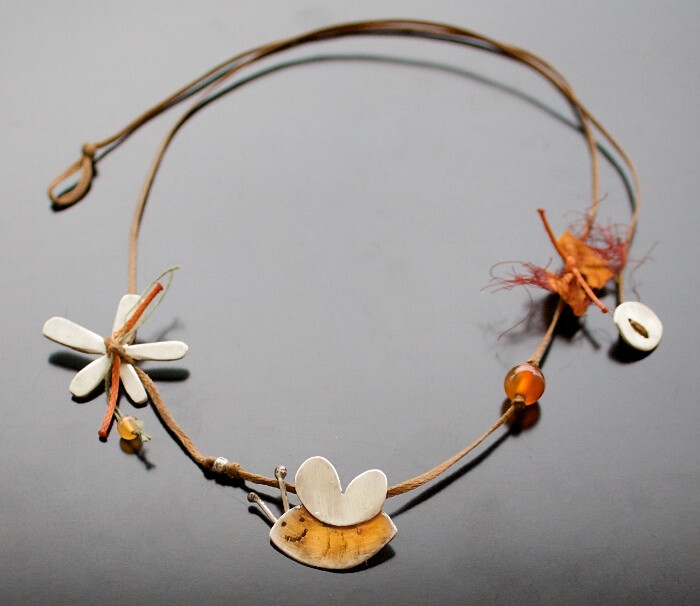 Bee and Flower Necklace - Sterling silver, enameled bee, sterling silver flower, carnelian, waxed linen cord, silk ribbon.