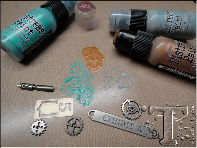 step 21: dab various colors of distress paint to craft sheet for a palette to alter any embellishments.