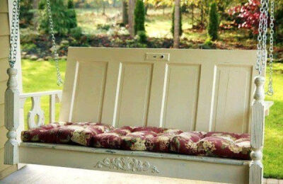 I love this porch swing made out of old doors. It spells character.