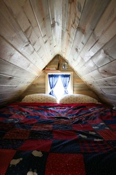 Bedroom in a 127 square foot home.