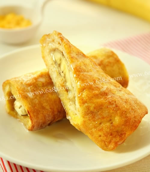营养早餐香蕉吐司卷的做法 工 艺：煎口 味：奶香味难 度：初级入门人 数：1准备时间：5分钟烹饪时间：&amp;lt;5分钟 香蕉吐司卷的主料：吐司2片、香蕉1根、鸡蛋2个 香蕉吐司卷的辅料：炼乳5克 香蕉吐司卷的做法： 1、吐司切去掉四边，放微波炉叮30秒打软；香蕉切成和吐司差不多长度的2片 2、吐司片将…http://www.6a8a.com/caipu/68337/
