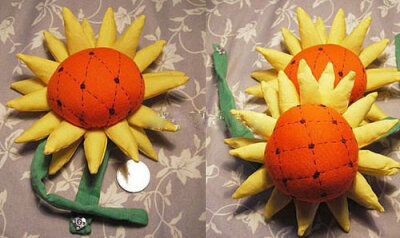 五颜六色的布艺组合而成的向日葵,总能给人愉悦的心情,想要亲手diy出