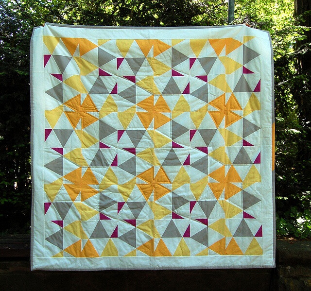 &amp;quot;zitronenfalter&amp;quot; from Ulrike Kittel's flickr - lieblingsdecke. A solids and triangles quilt to feed both our current quilty obsessions, al.